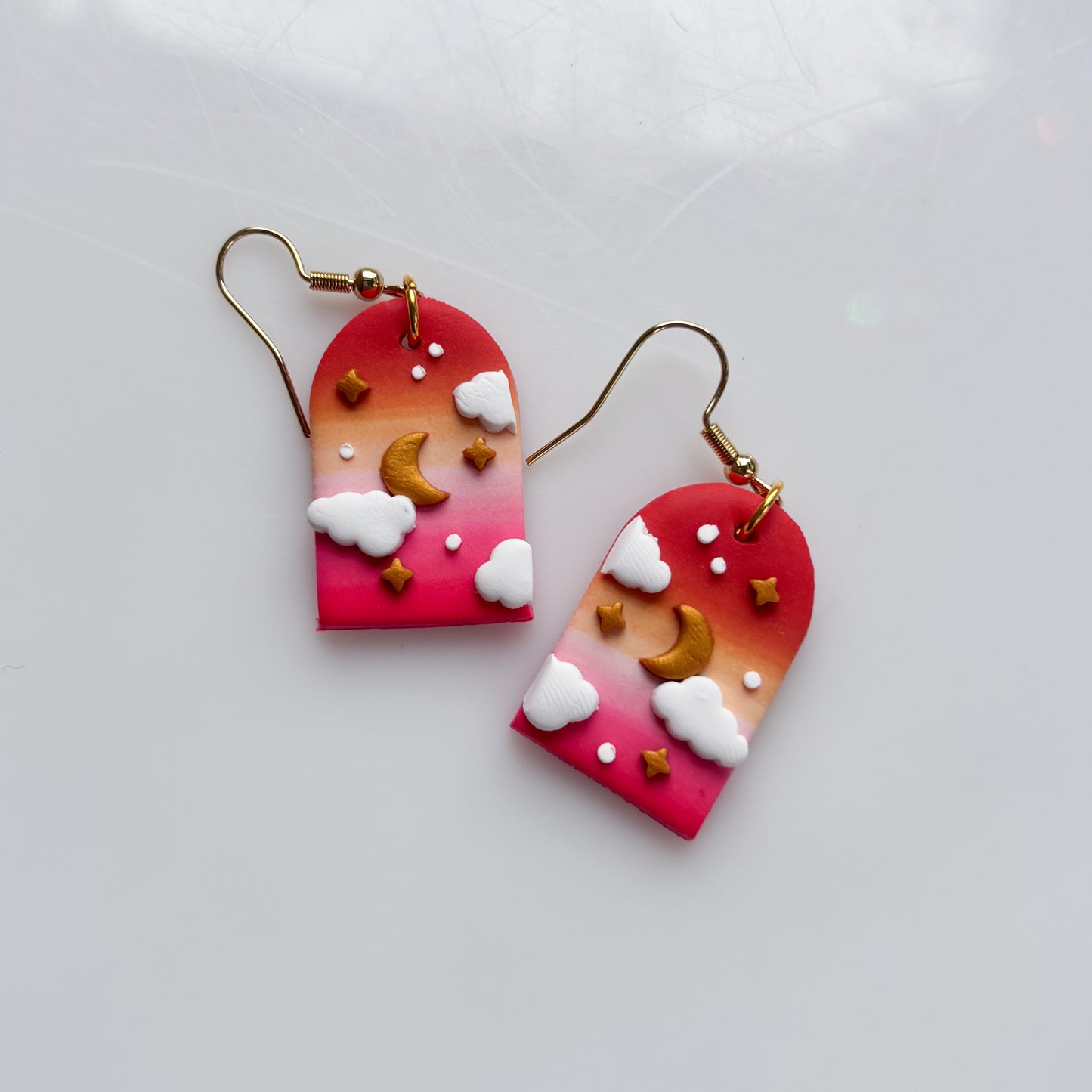 CLOUDY ARCH EARRINGS (LESBIAN FLAG)