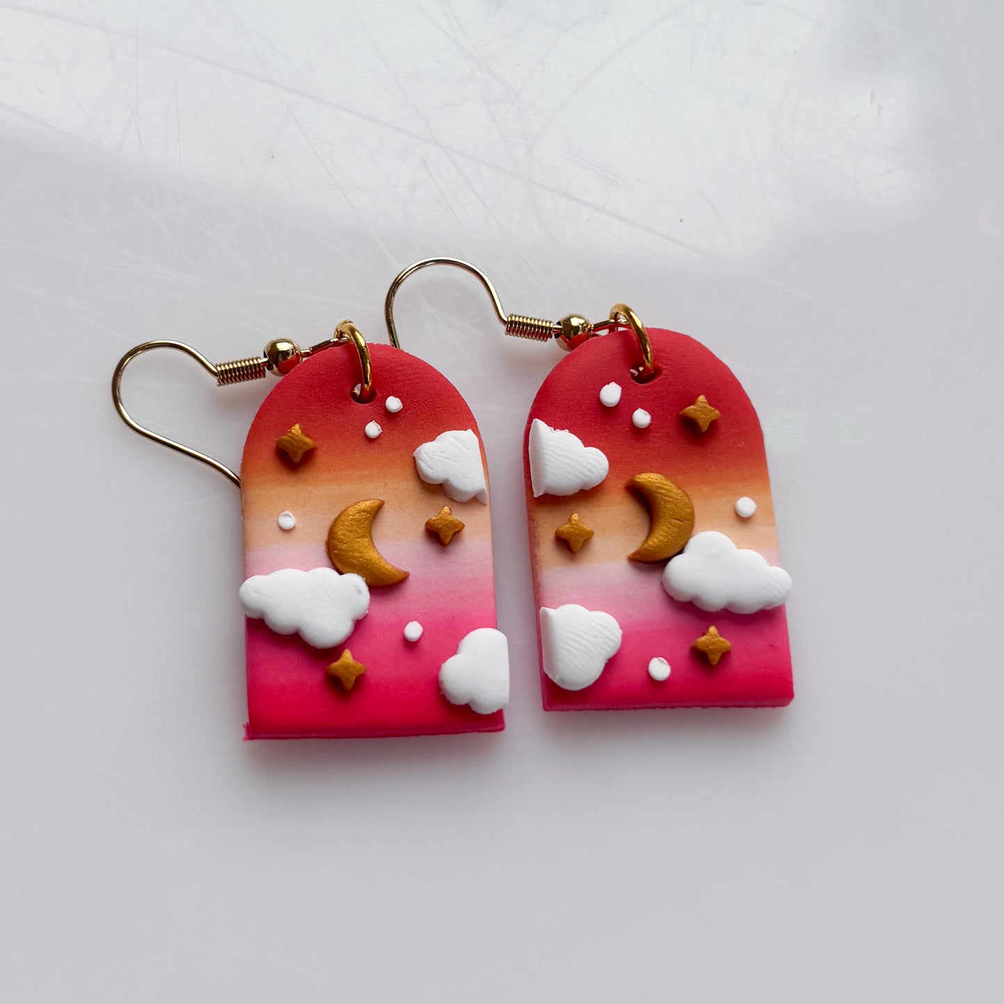 CLOUDY ARCH EARRINGS (LESBIAN FLAG)