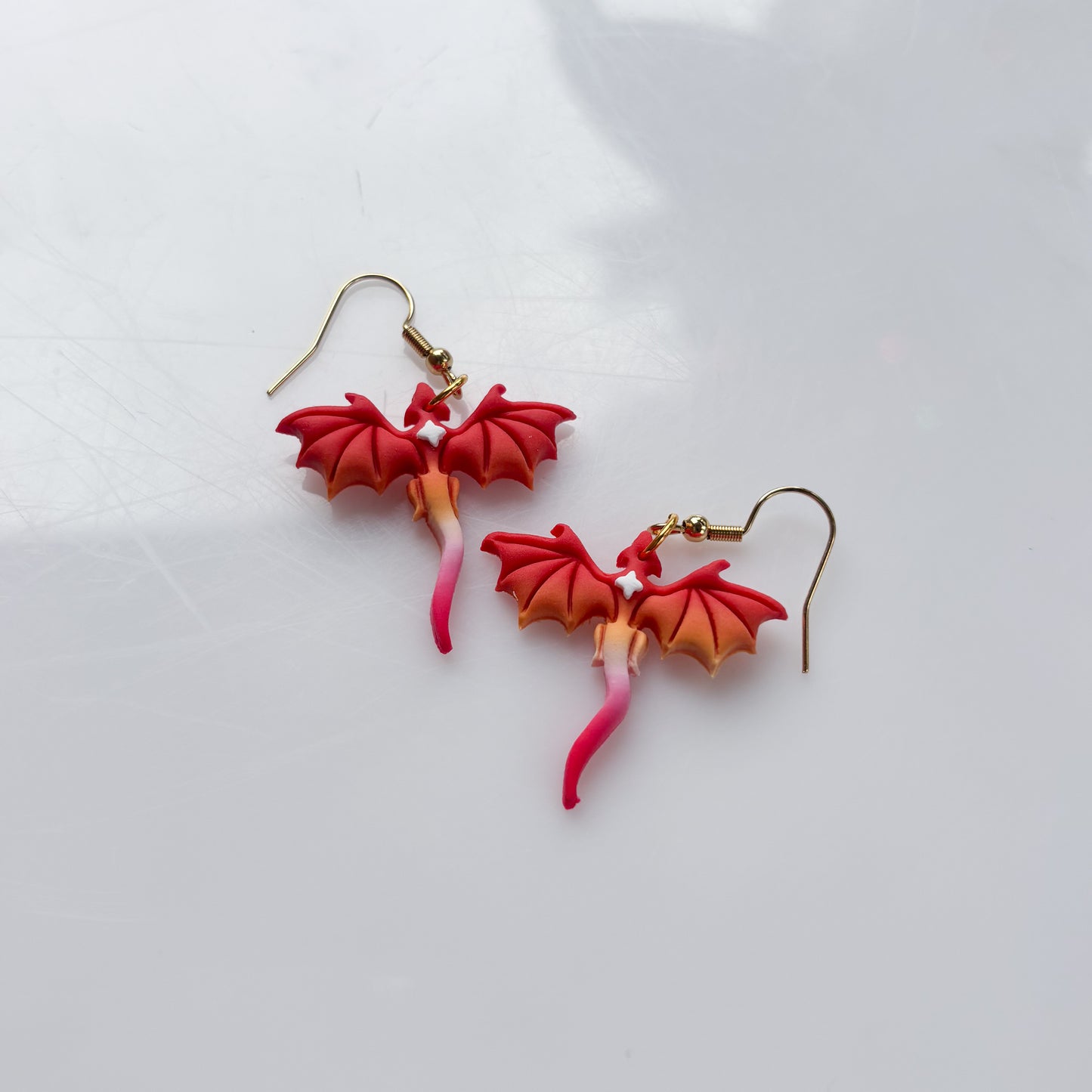MINI DRAGON EARRINGS (LESBIAN FLAG)