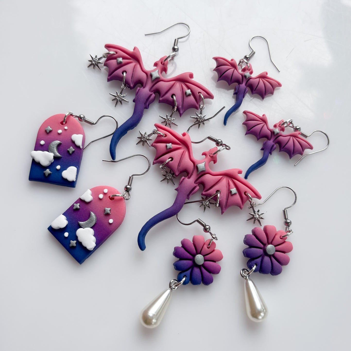 MINI DRAGON EARRINGS (BI FLAG)