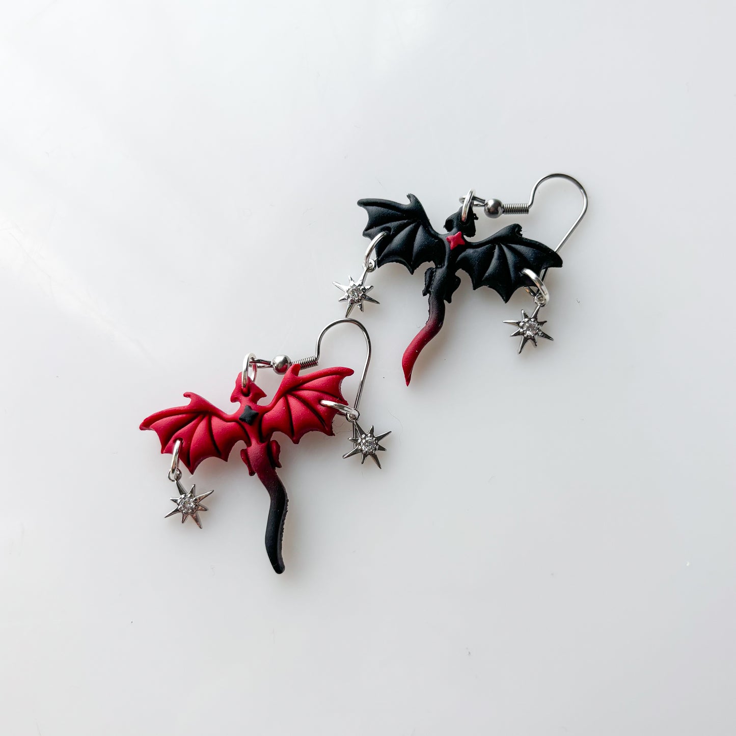 ASTEROID RED/BLACK MINI DRAGON EARRINGS