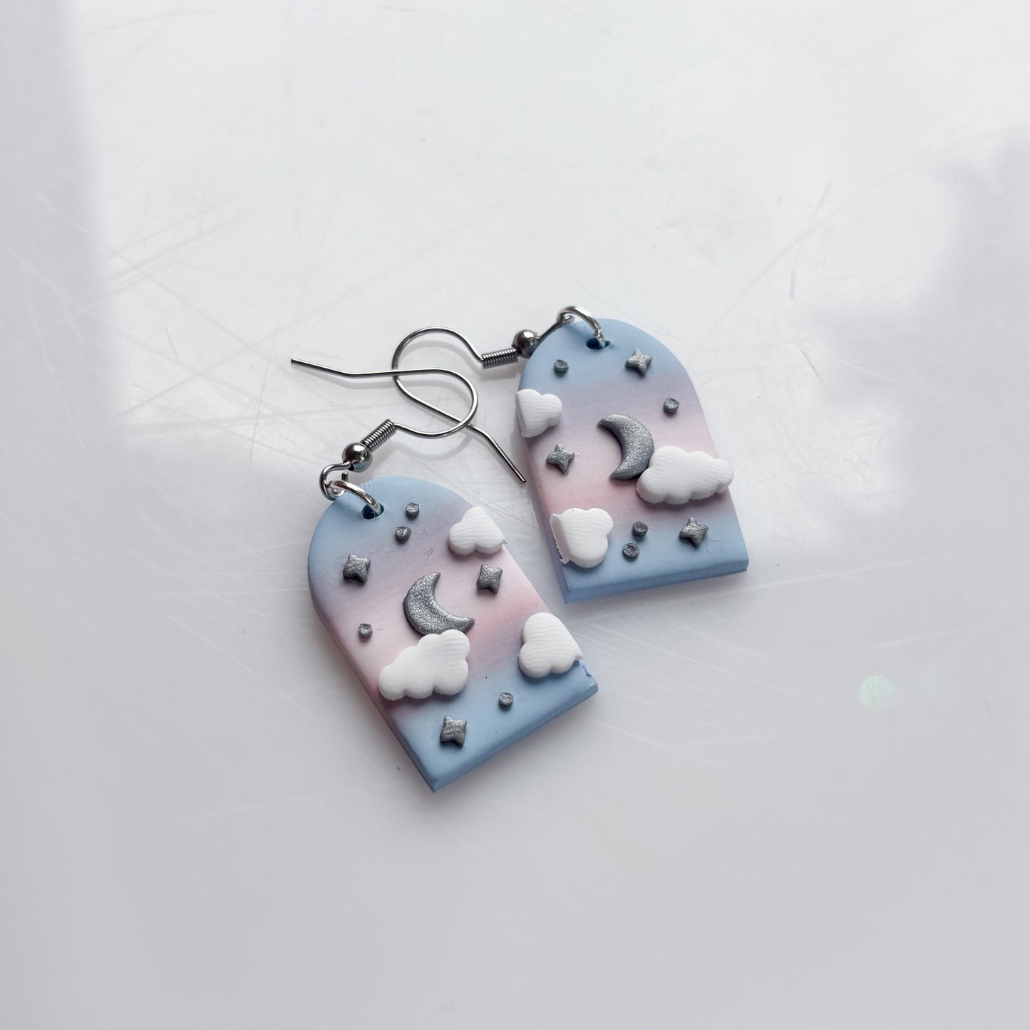 CLOUDY ARCH EARRINGS (TRANS FLAG)