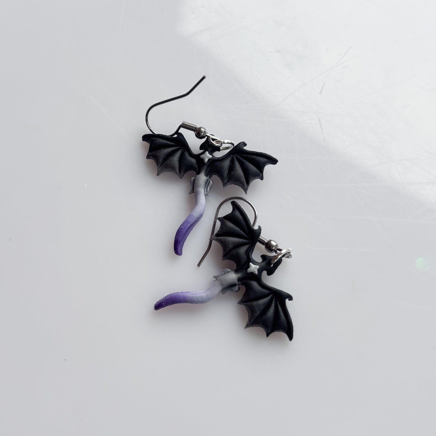 MINI DRAGON EARRINGS (ACE FLAG)