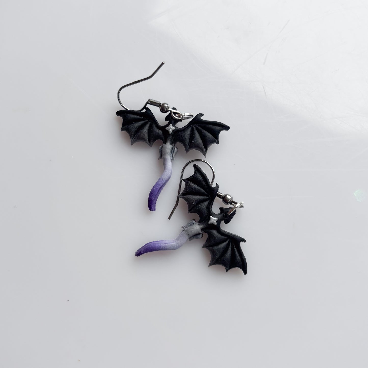 MINI DRAGON EARRINGS (ACE FLAG)