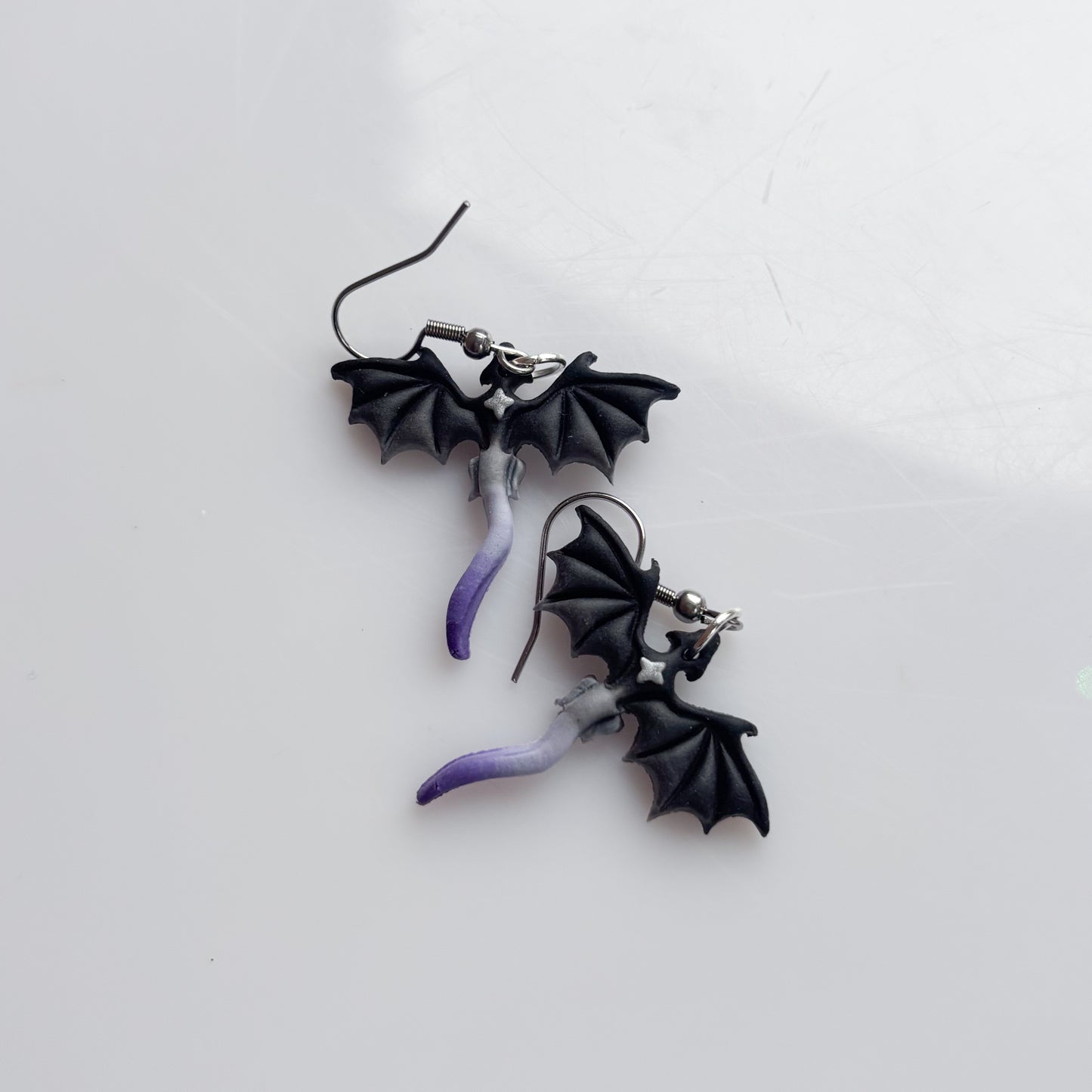 MINI DRAGON EARRINGS (ACE FLAG)