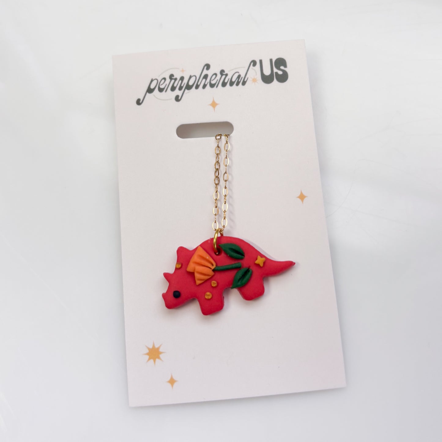 RED ORANGE POPPY DINO NECKLACE (TRICERATOPS)