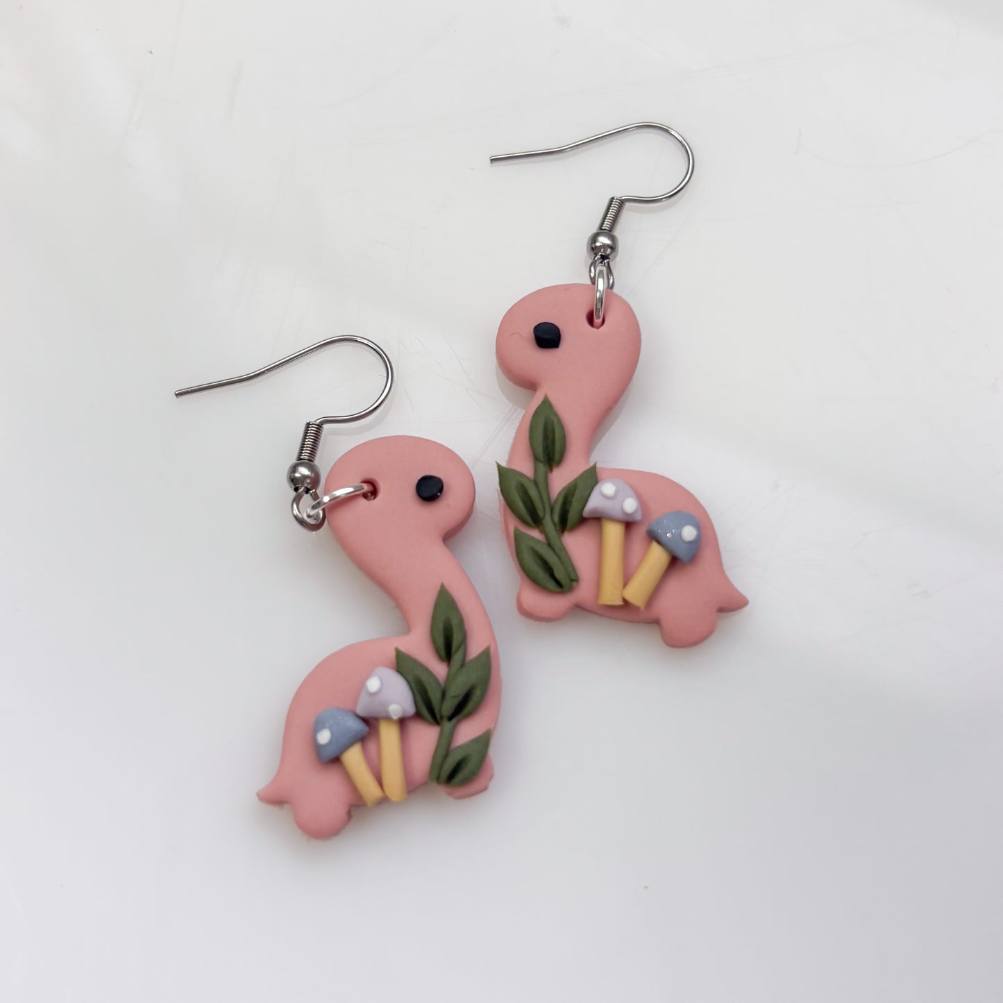 PINK PASTEL MUSHROOM DINO EARRINGS (BRONTO)