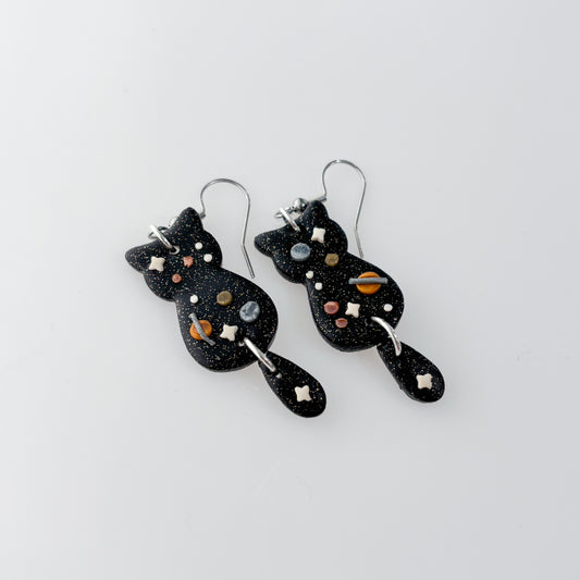 SPACE HANGING TAIL CAT EARRINGS
