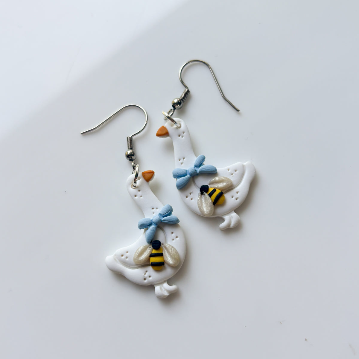 BEE BLUE BOW GEESE EARRINGS