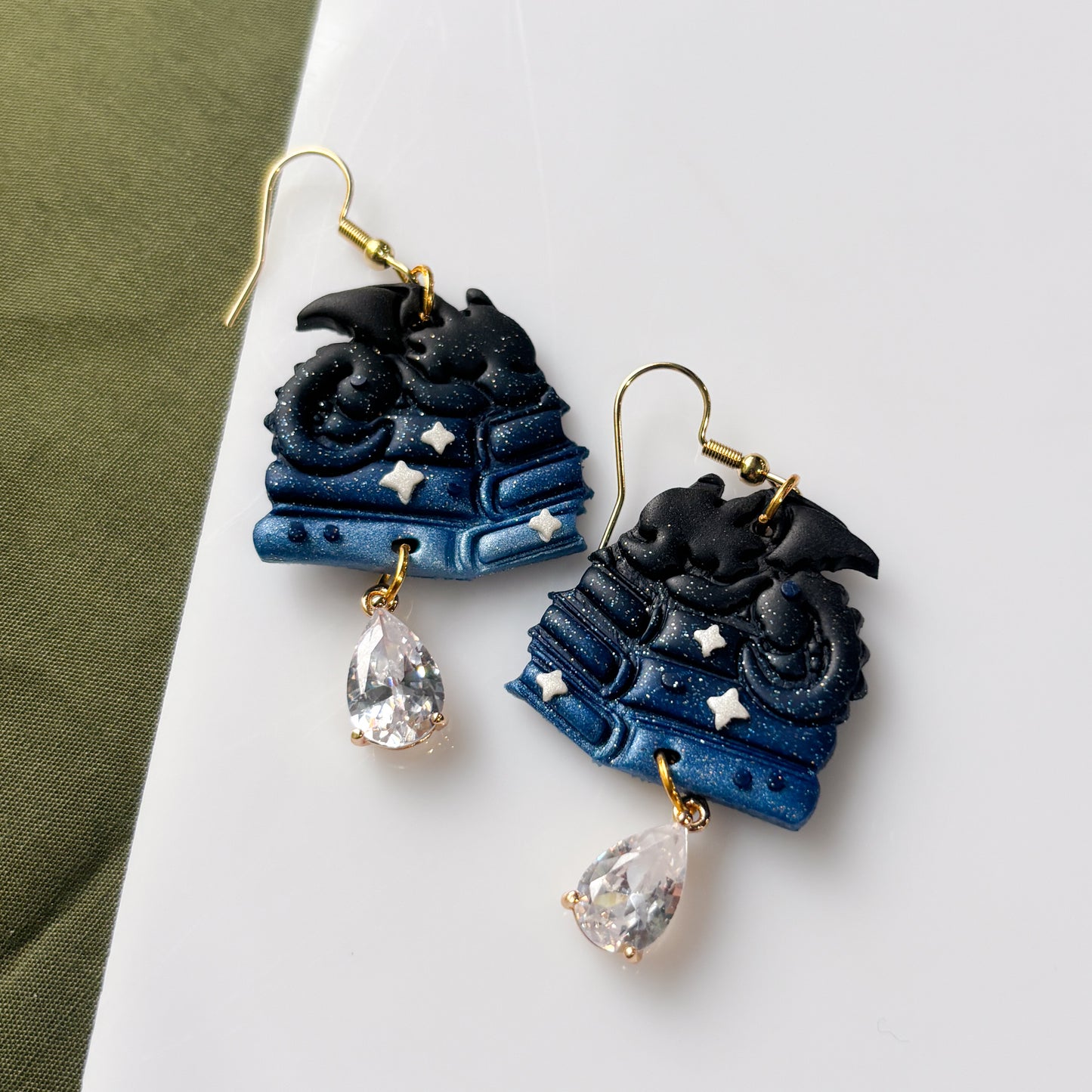 STARRY BLUE DRAGONS ON BOOKS EARRINGS