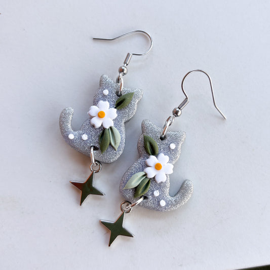 SILVER GLITTER DAISY CAT EARRINGS