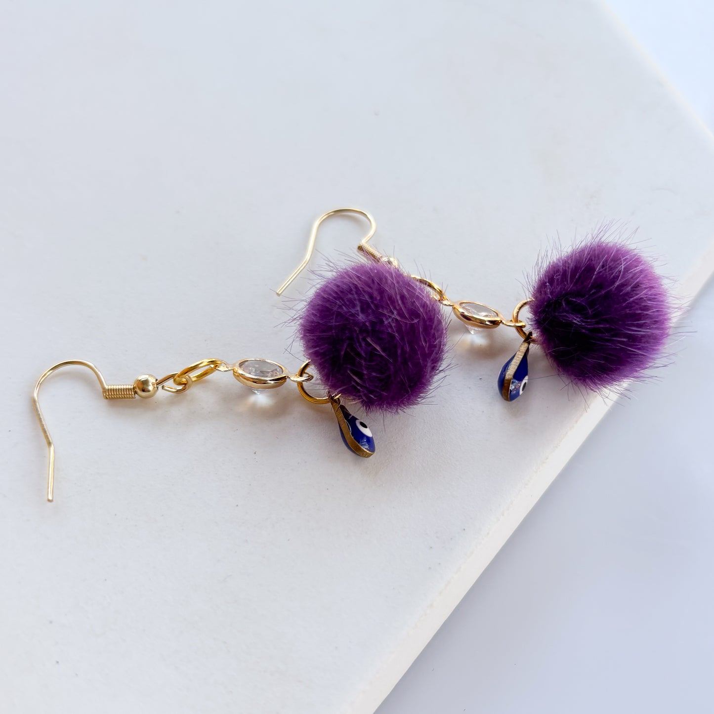 PURPLE & EVIL EYE MINI POM POM & GEM CHARM EARRINGS