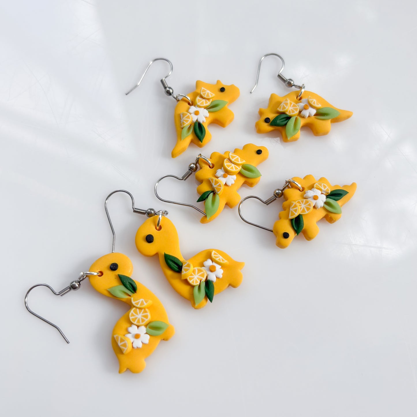 LEMON DINO EARRINGS (STEGO)