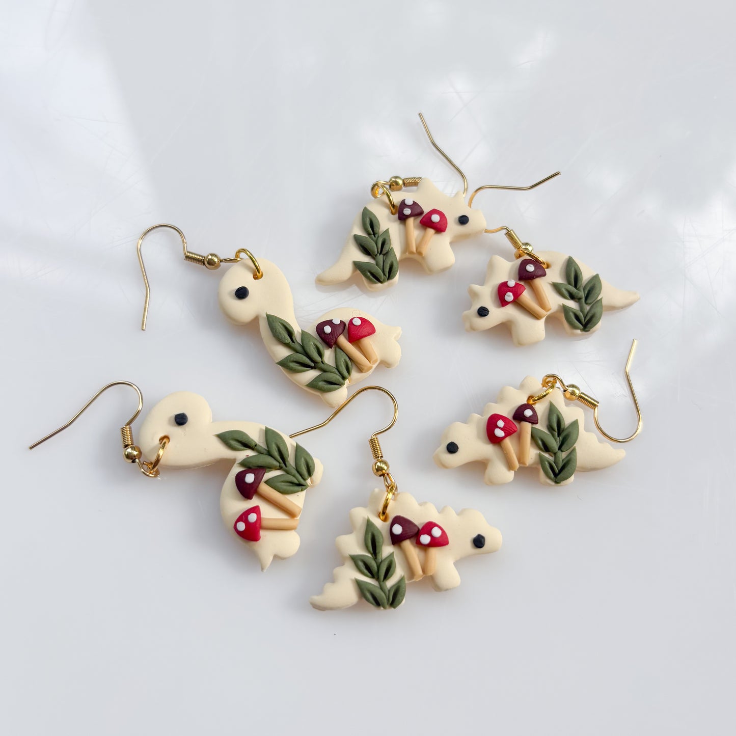 IVORY MUSHROOM DINO EARRINGS (TRICERATOPS)