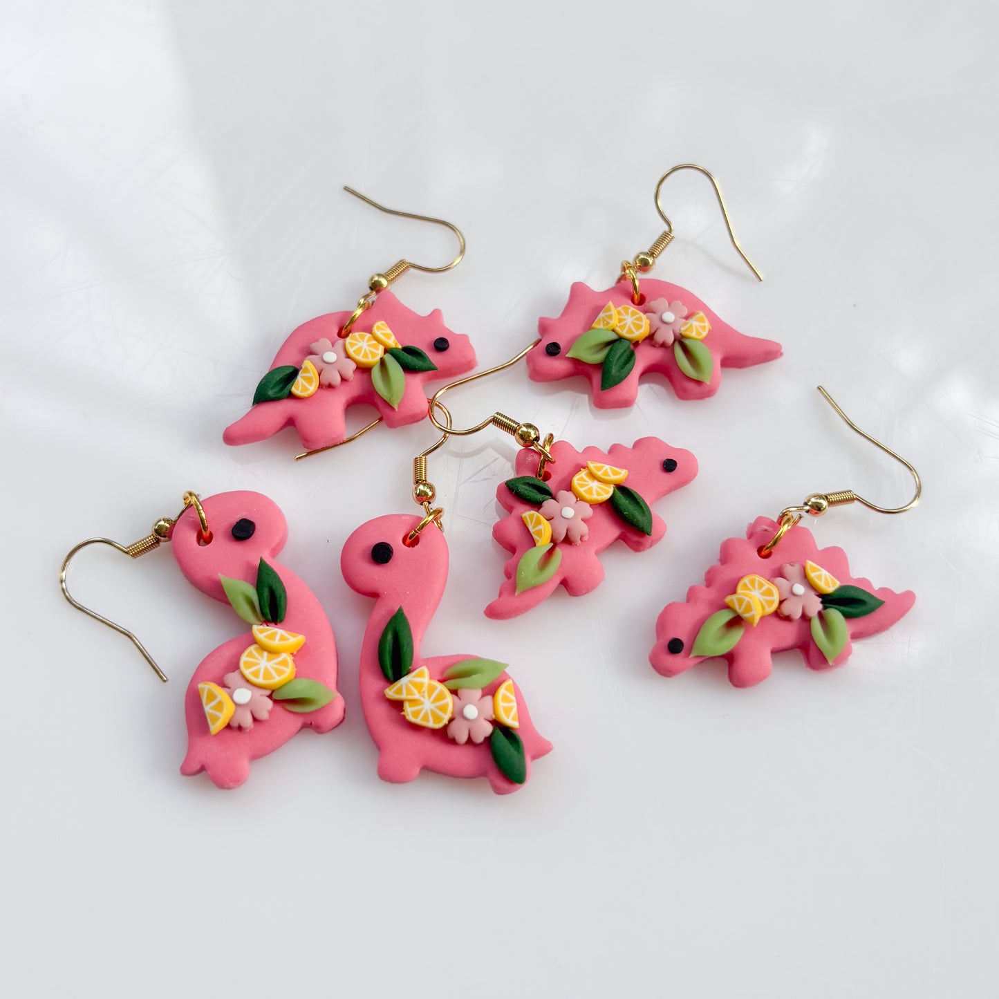 PINK LEMONADE DINO EARRINGS (STEGO)