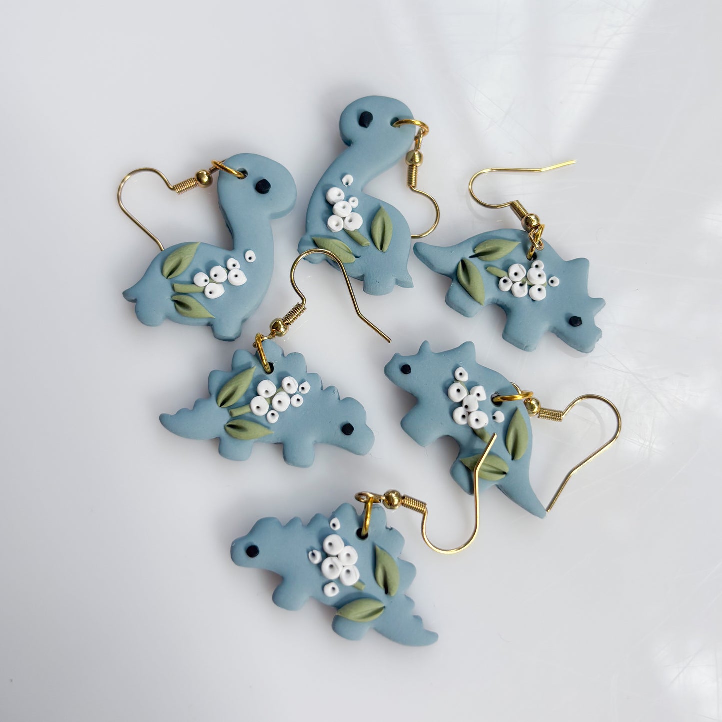 BLUE BABYS BREATH DINO EARRINGS (TRICERATOPS)