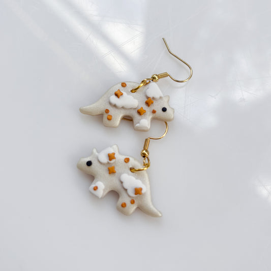 PEARL CLOUDY DINO EARRINGS (TRICERATOPS)