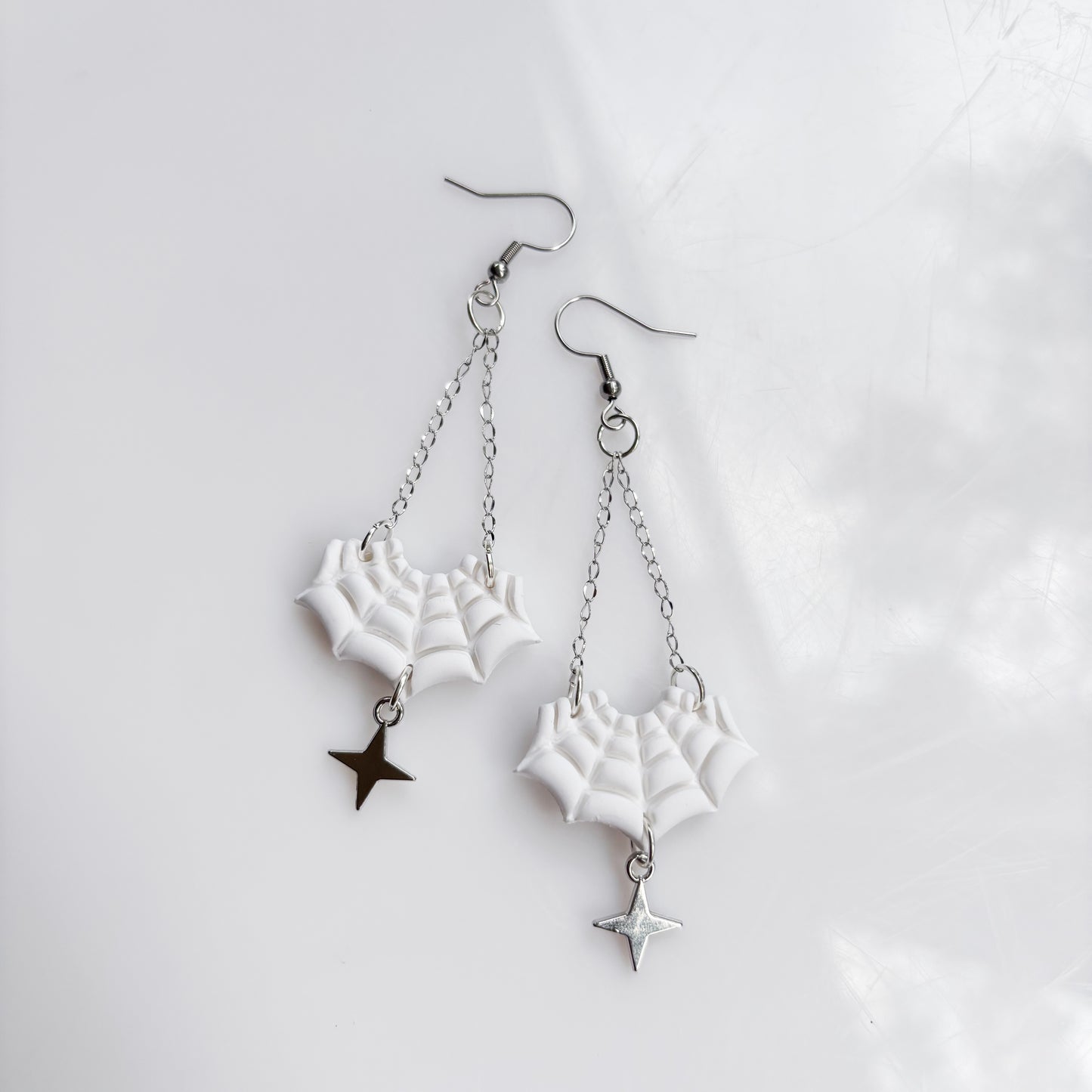 SPIDERWEB DANGLY EARRINGS