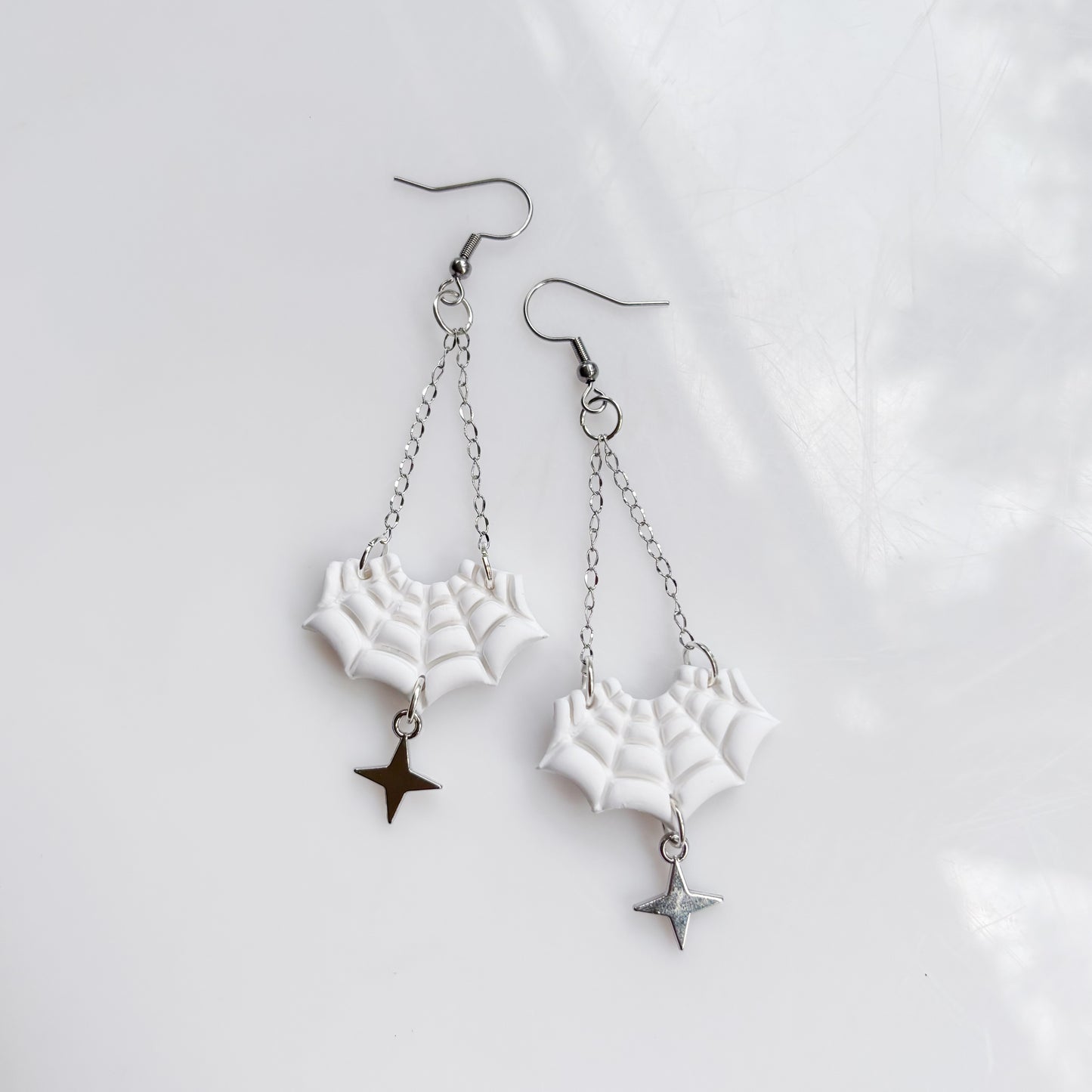 SPIDERWEB DANGLY EARRINGS