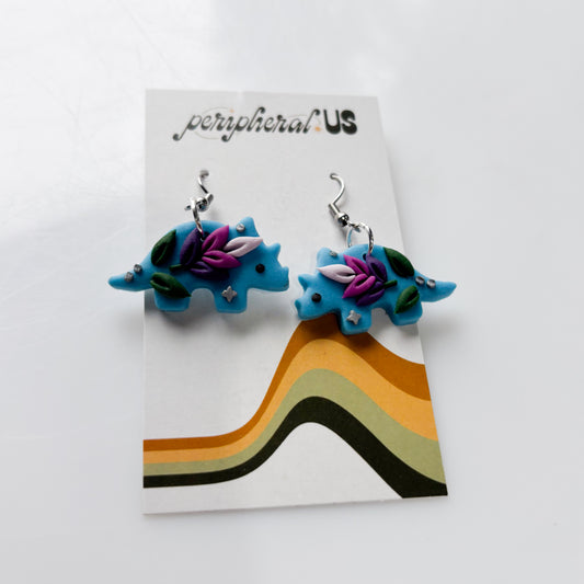 BLUE LAVENDER TRICERATOPS DINO EARRINGS