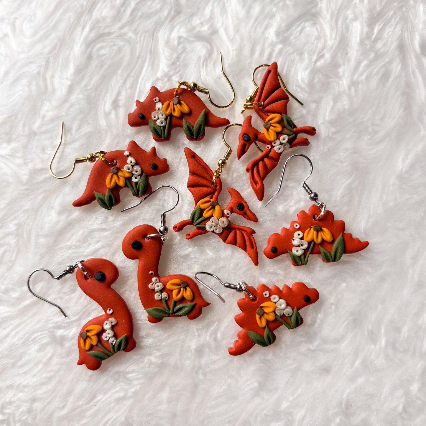 FALL FLORAL DINO EARRINGS (STEGOSAURUS)