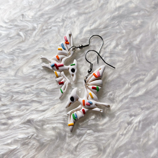 RAINBOW SPRINKLE DINO EARRINGS (PTERODACTYL)
