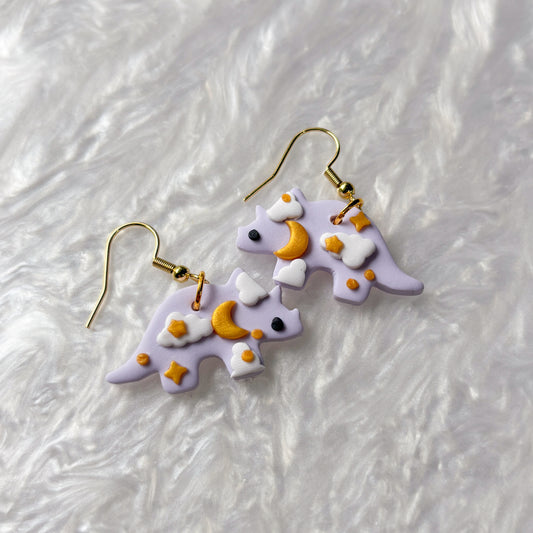 PURPLE CELESTIAL DINO EARRINGS (TRICERATOPS)