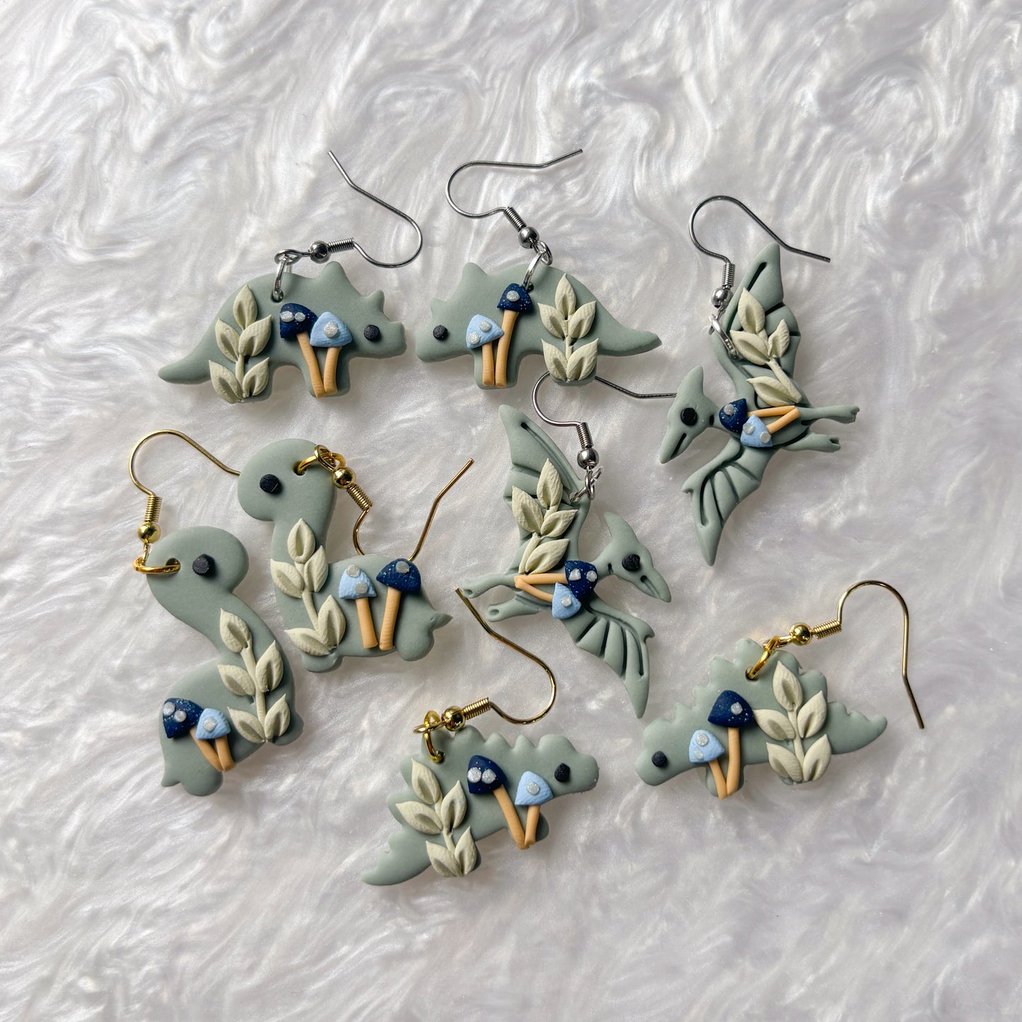 BLUE MUSHROOM DINO EARRINGS (BRONTO)