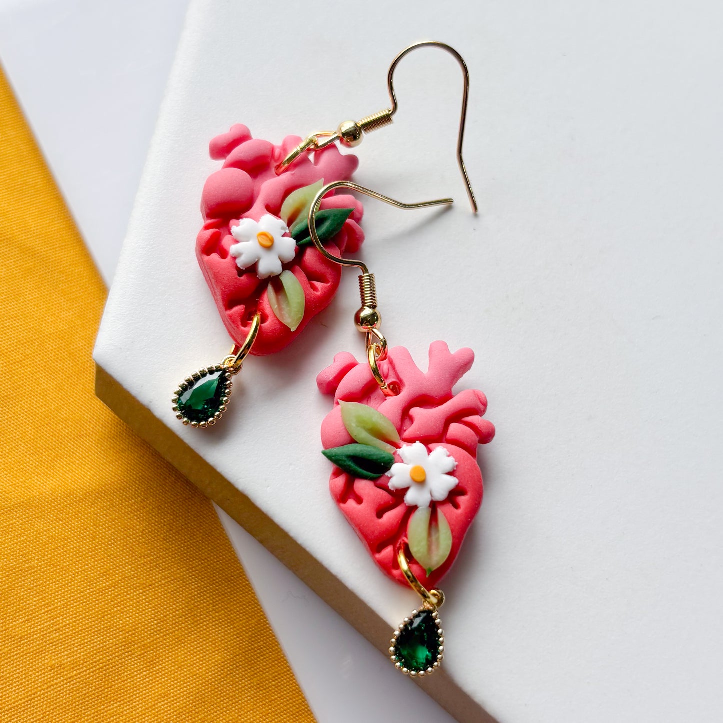 PINK DAISY ANATOMICAL HEART EARRINGS