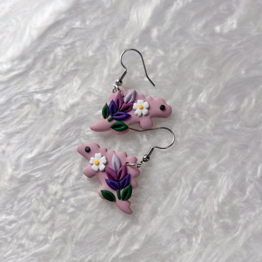 LAVENDER DINO EARRINGS (STEGOSAURUS)