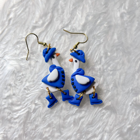BLUE RAIN COAT GEESE