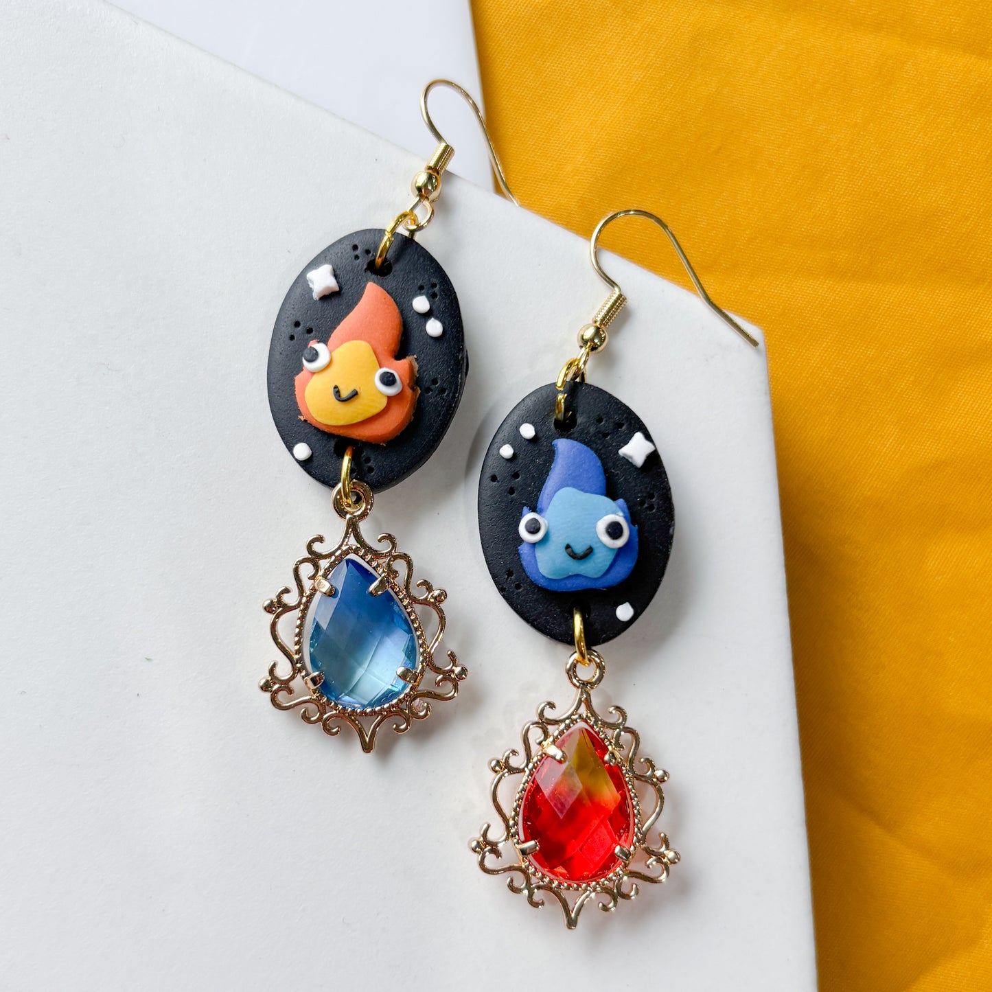 MISMATCHED FLAME SPIRIT OVAL EARRINGS