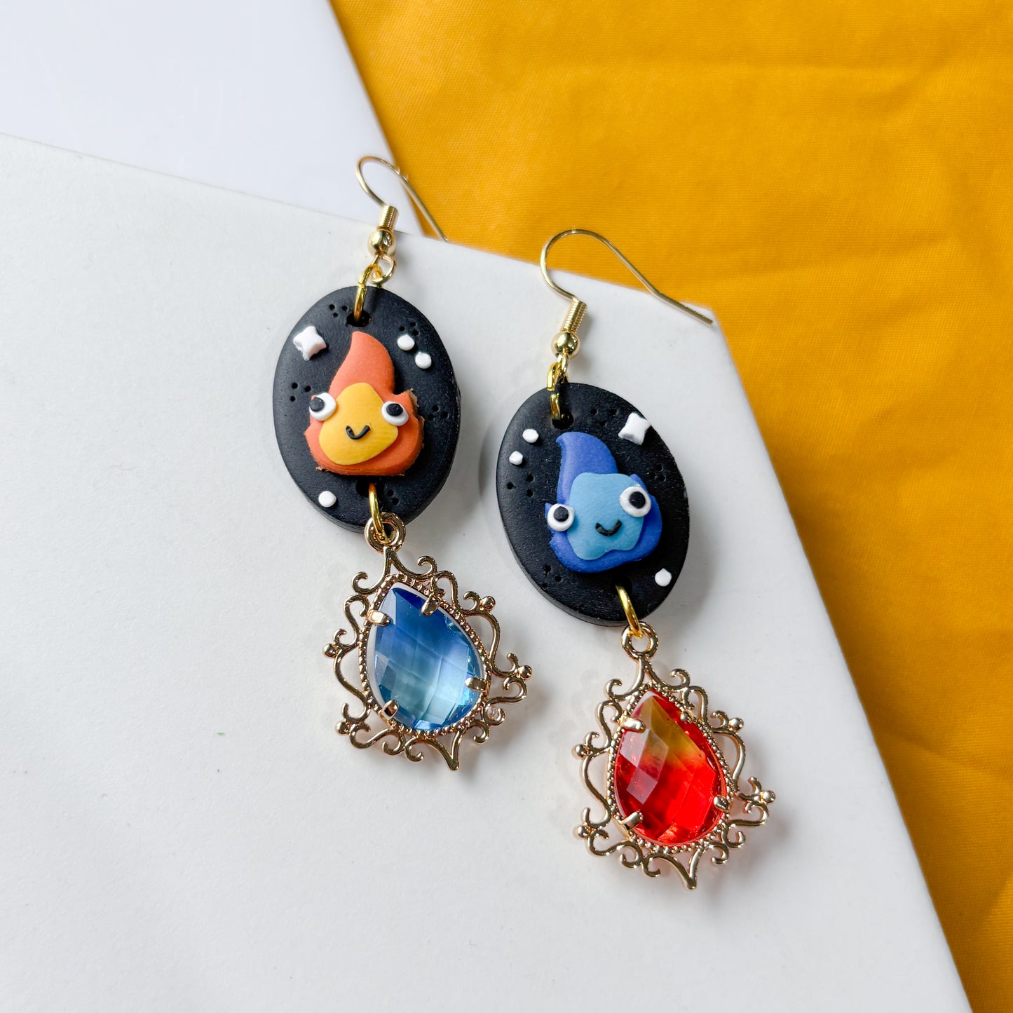 MISMATCHED FLAME SPIRIT OVAL EARRINGS