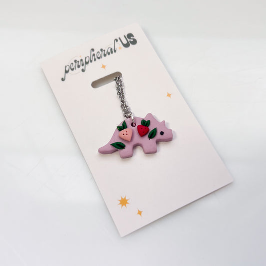 LILAC STRAWBERRY DINO NECKLACE (TRICERATOPS)