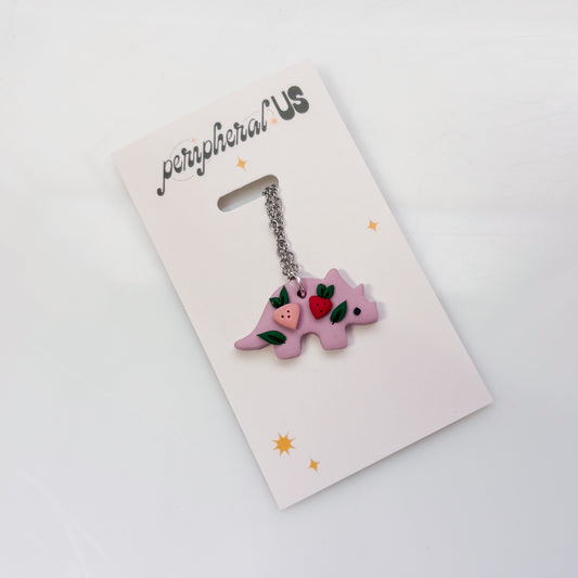 LILAC STRAWBERRY DINO NECKLACE (TRICERATOPS)