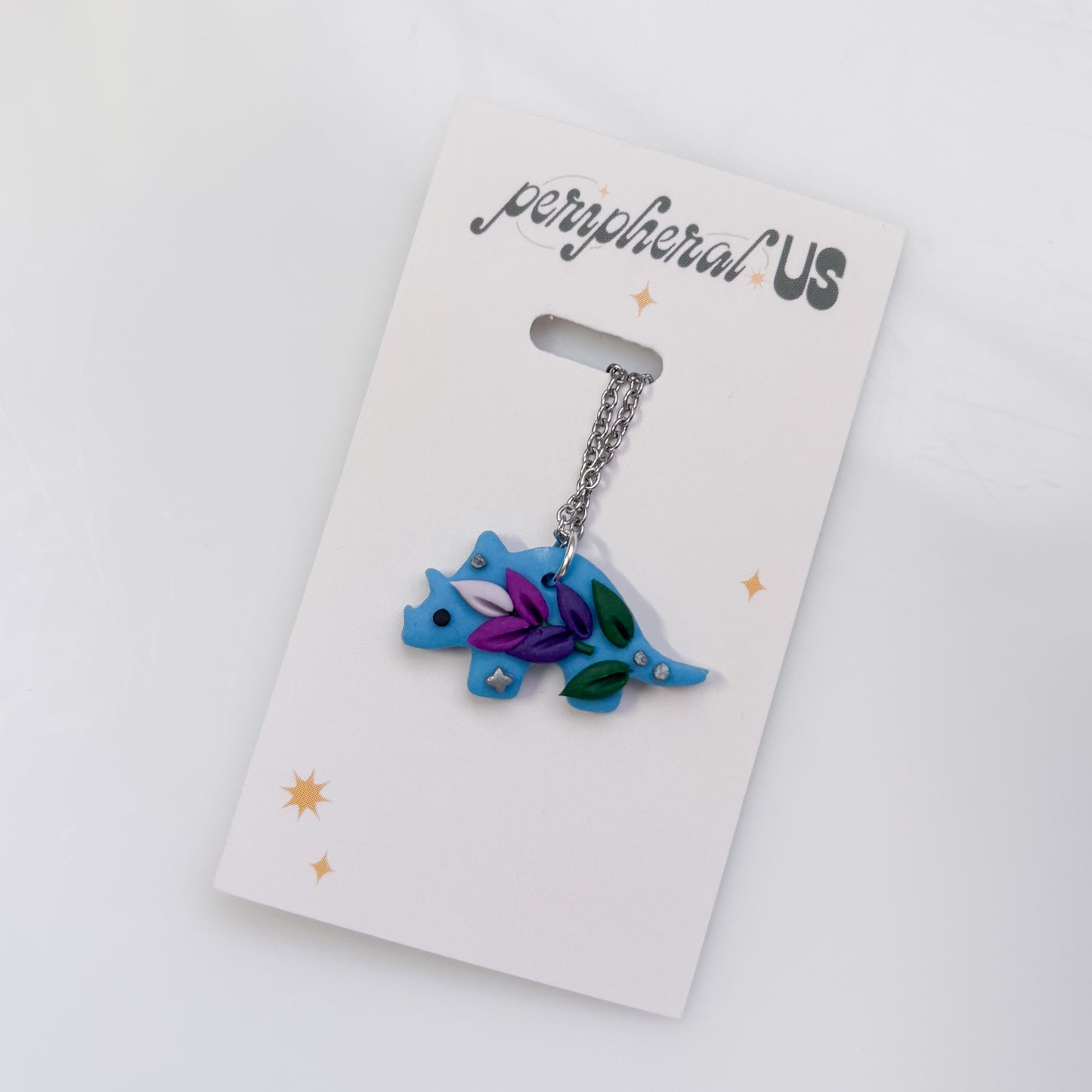 BLUE LAVENDER DINO NECKLACE (TRICERATOPS)