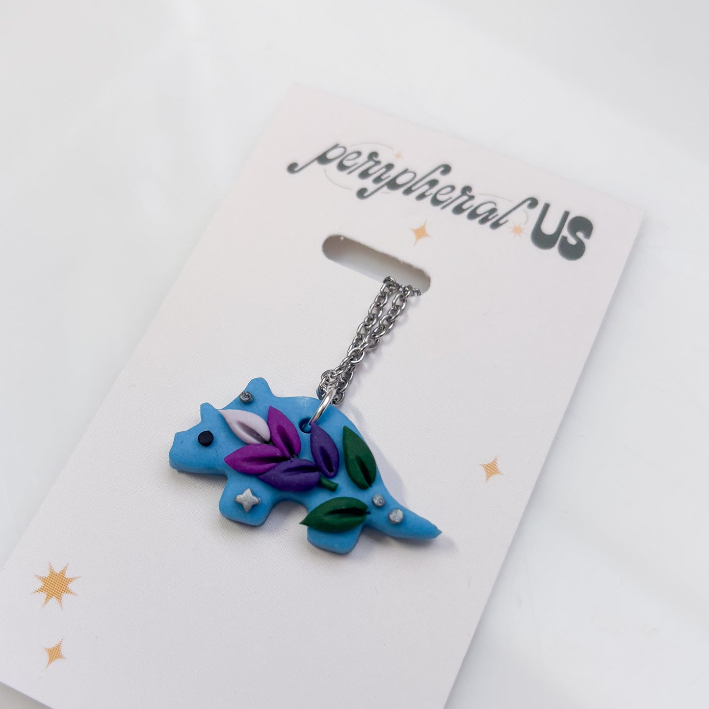 BLUE LAVENDER DINO NECKLACE (TRICERATOPS)
