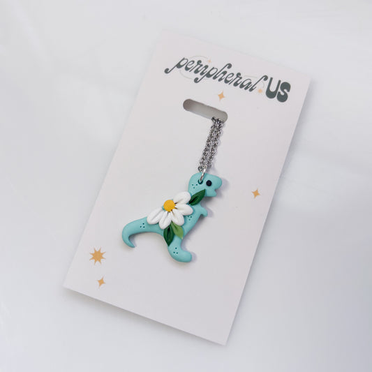 AQUA DAISY DINO NECKLACE (T REX)