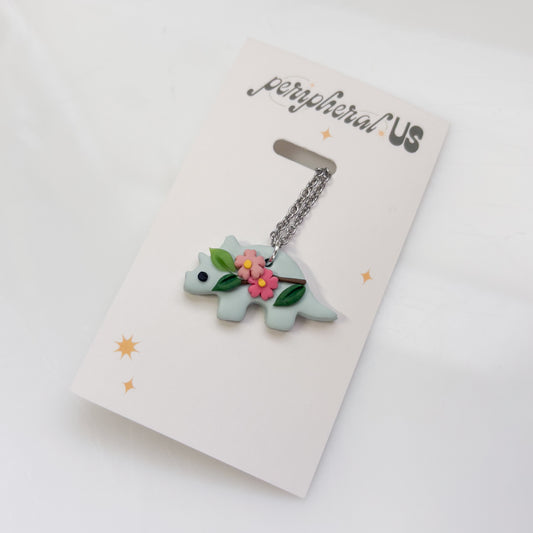 GLACIER BLUE CHERRY BLOSSOM DINO NECKLACE (TRICERATOPS)