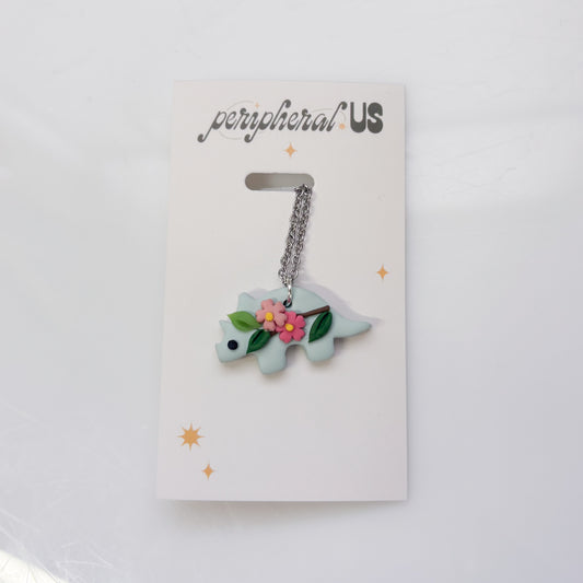 GLACIER BLUE CHERRY BLOSSOM DINO NECKLACE (TRICERATOPS)