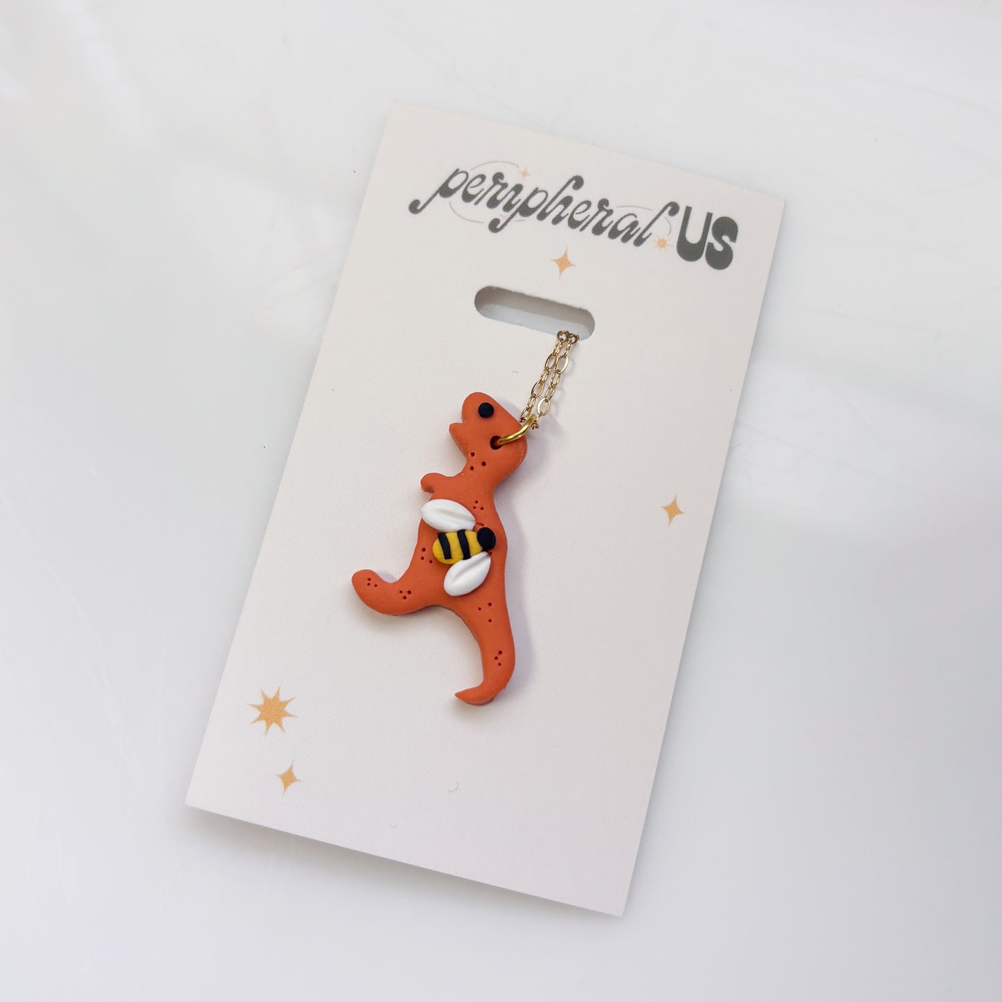 ORANGE BEE DINO NECKLACE (T REX)