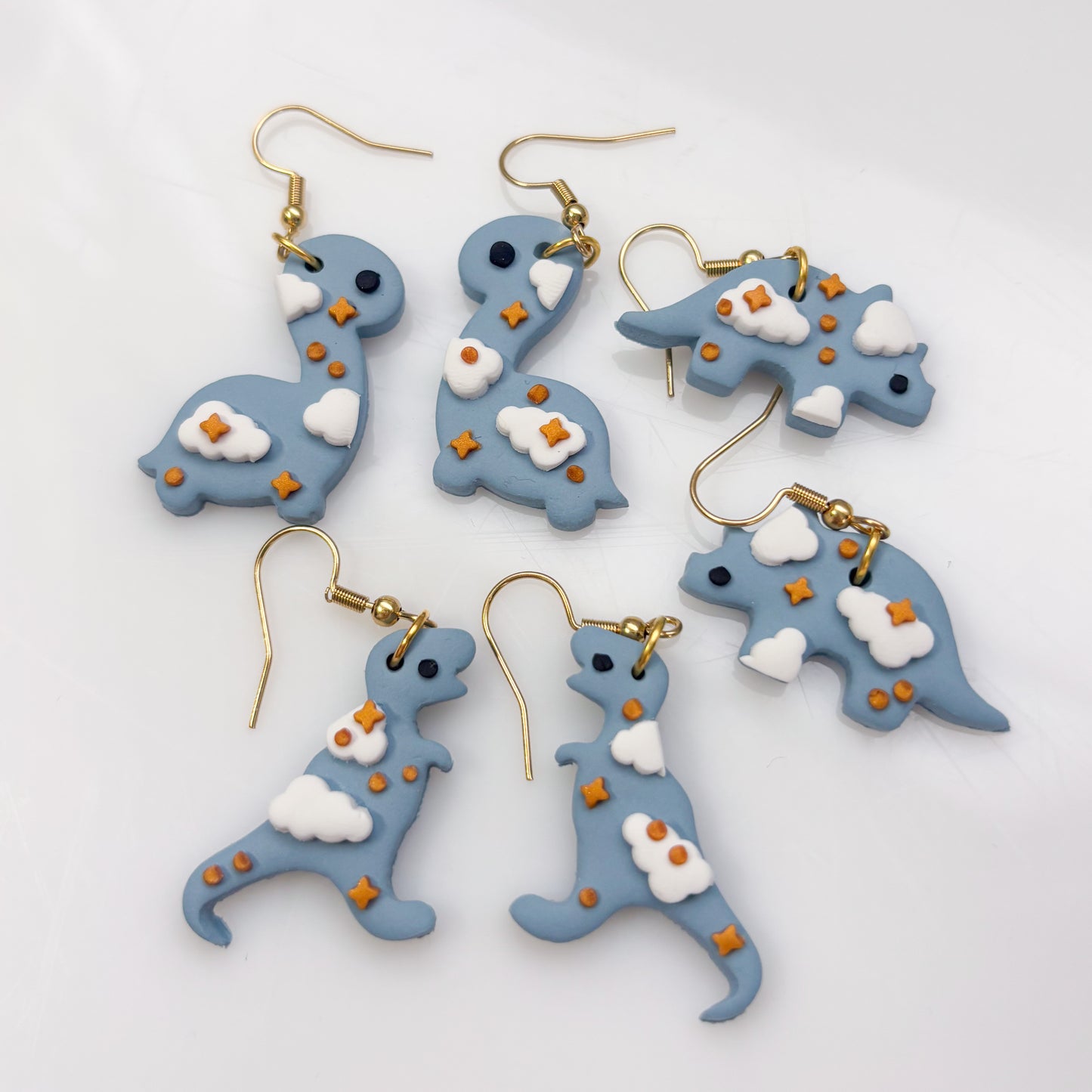 CLOUDY DINO EARRINGS (BRONTO)