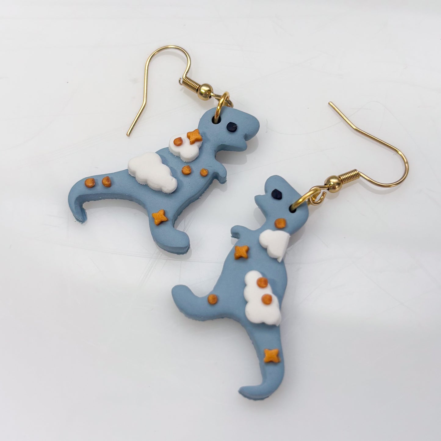 CLOUDY DINO EARRINGS (T REX)