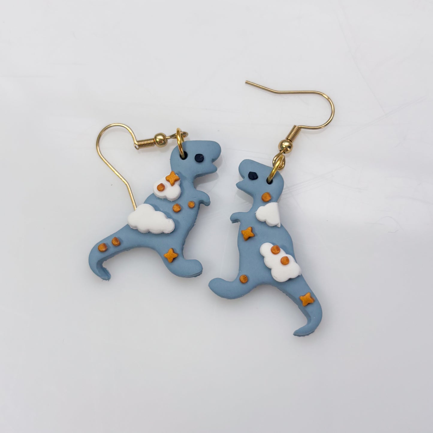 CLOUDY DINO EARRINGS (T REX)