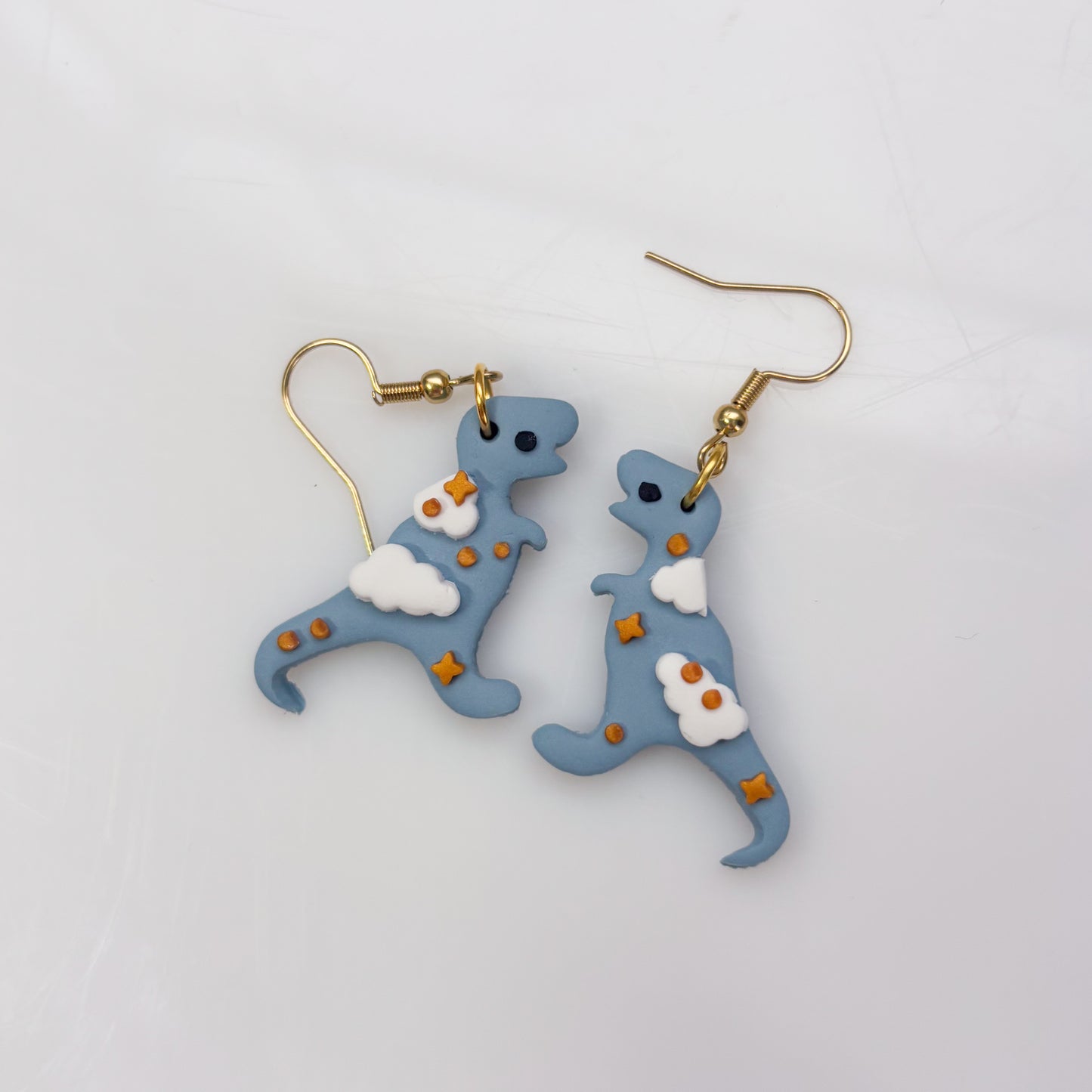 CLOUDY DINO EARRINGS (T REX)
