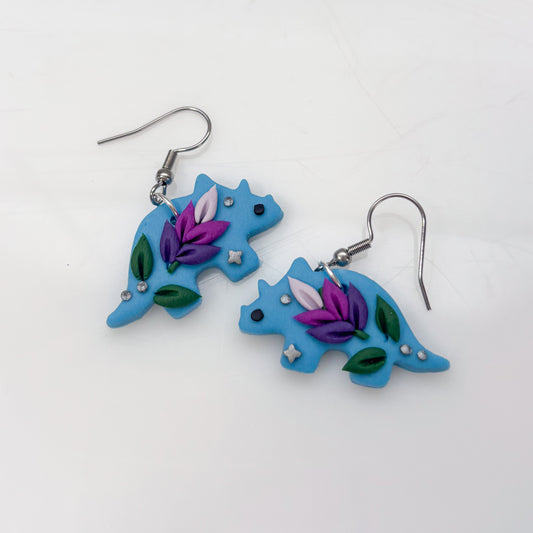 BLUE LAVENDER DINO EARRINGS (TRICERATOPS)