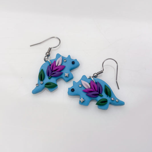 BLUE LAVENDER DINO EARRINGS (TRICERATOPS)