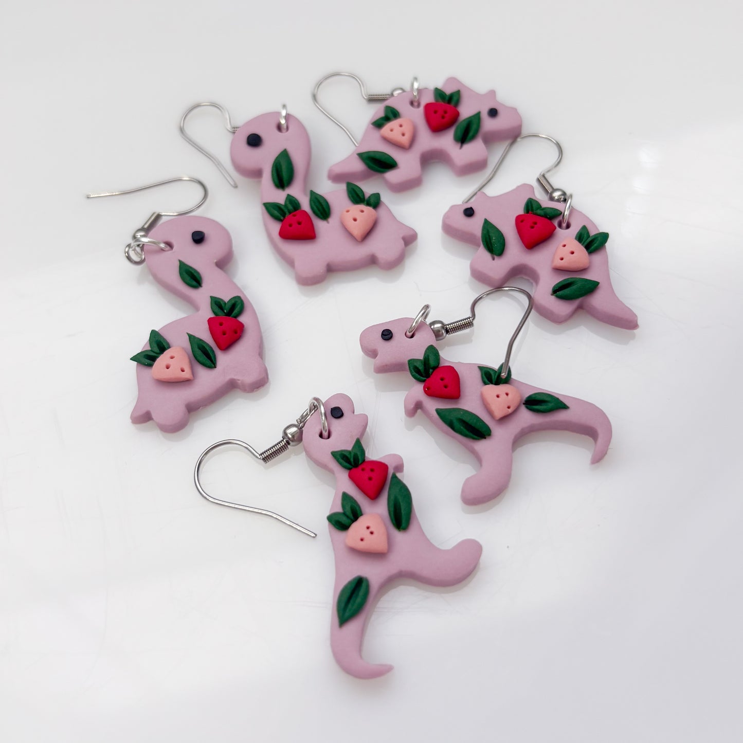 LILAC STRAWBERRY DINO EARRINGS (BRONTO)