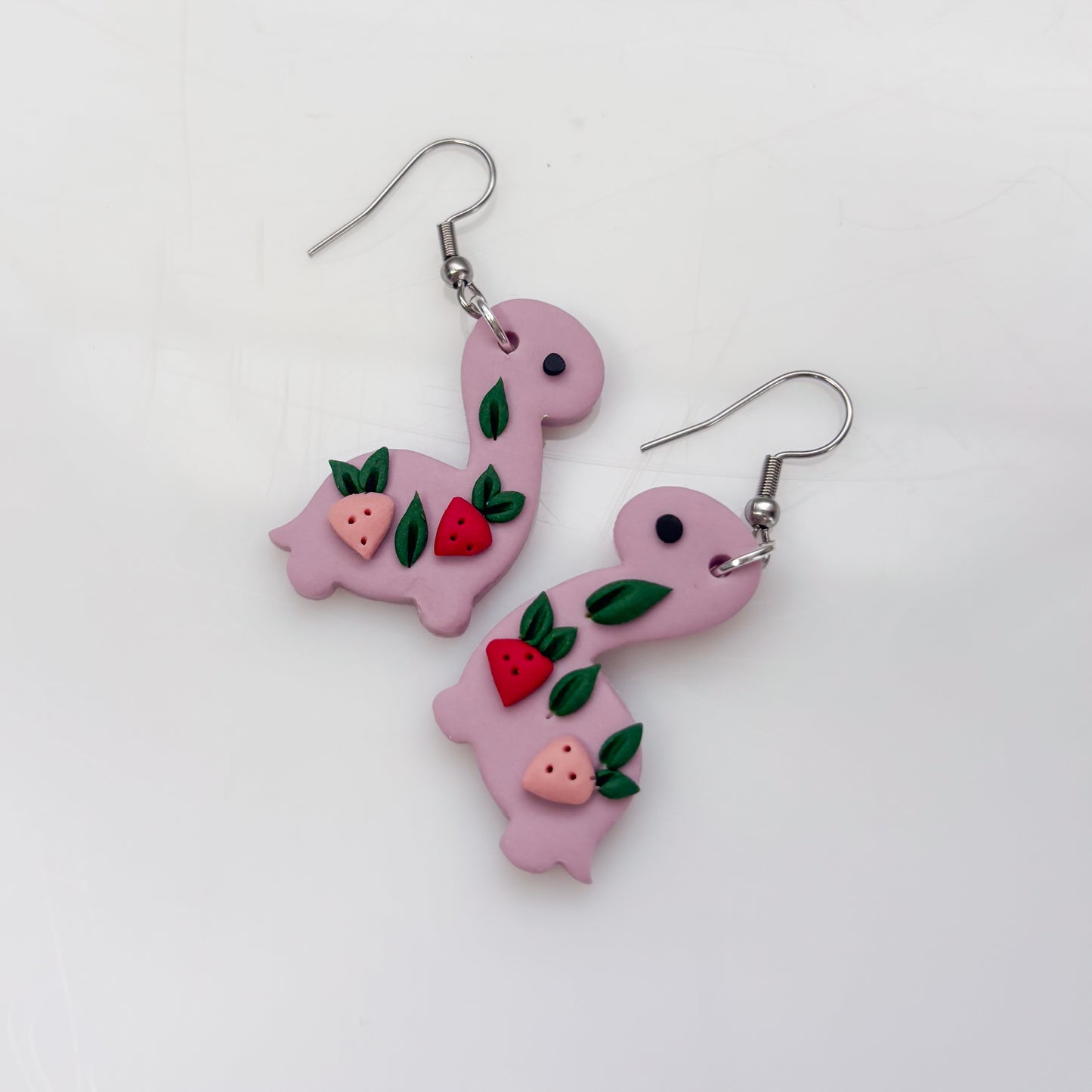 LILAC STRAWBERRY DINO EARRINGS (BRONTO)