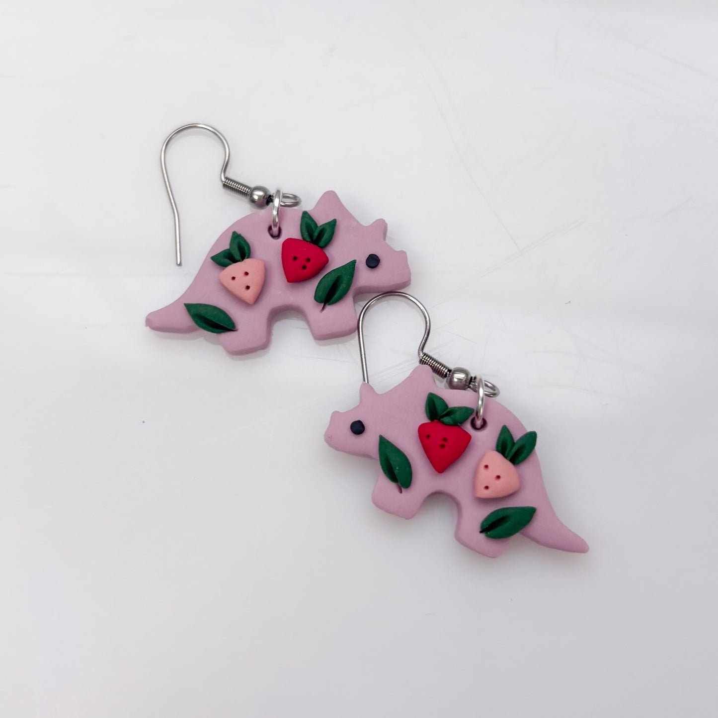 LILAC STRAWBERRY DINO EARRINGS (TRICERATOPS)
